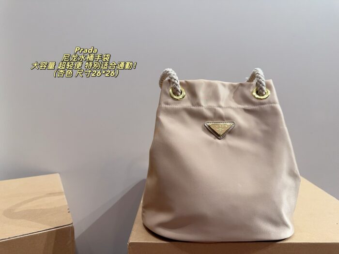 Prada Nylon Bucket Bag Spacious And Ultra-Lightweight For Commuting Metal Rings On Both Sides For Attaching Charms - Image 10