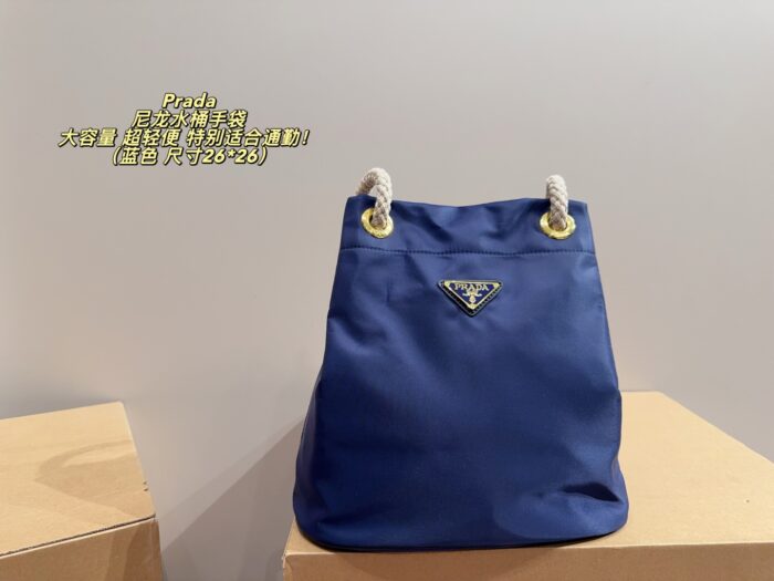 Prada Nylon Bucket Bag Spacious And Ultra-Lightweight For Commuting Metal Rings On Both Sides For Attaching Charms - Image 13
