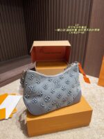 Louis Vuitton Denim Horn Bag Stylish And Stunning - Image 2