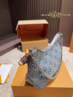 Louis Vuitton Denim Horn Bag Stylish And Stunning - Image 4