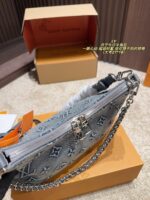 Louis Vuitton Denim Horn Bag Stylish And Stunning - Image 7