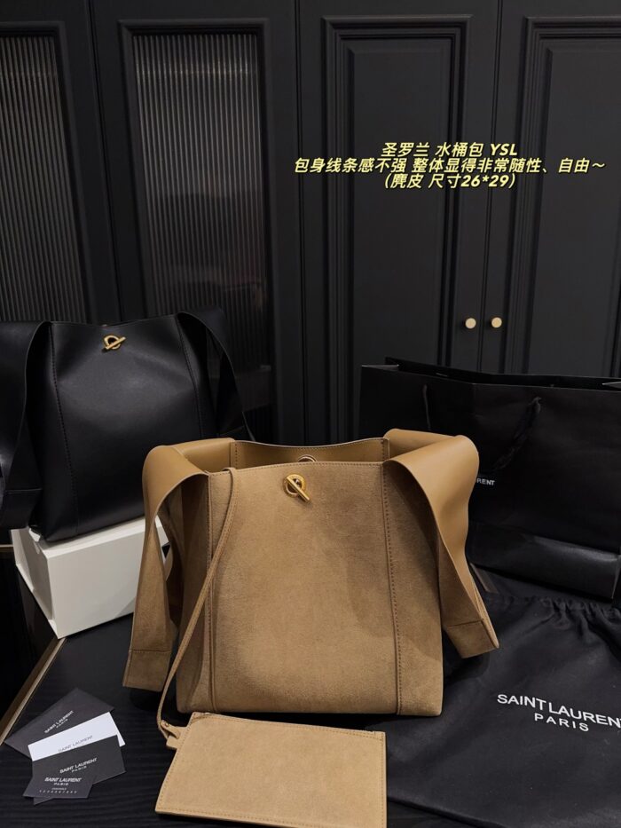 Yves Saint Laurent Cassandre Logo Bucket Bag Soft And Effortless Versatile Black And Gold Adjustable Shoulder Strap - Image 1
