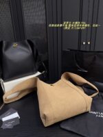 Yves Saint Laurent Cassandre Logo Bucket Bag Soft And Effortless Versatile Black And Gold Adjustable Shoulder Strap - Image 6