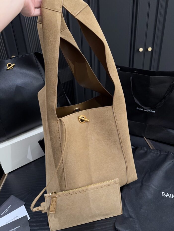 Yves Saint Laurent Cassandre Logo Bucket Bag Soft And Effortless Versatile Black And Gold Adjustable Shoulder Strap - Image 9