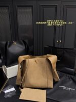 Yves Saint Laurent Cassandre Logo Bucket Bag Soft And Effortless Versatile Black And Gold Adjustable Shoulder Strap - Image 10