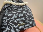 Miu Miu Graffiti Bucket Bag Baby Blue Colourway Playful And Whimsical - Image 9