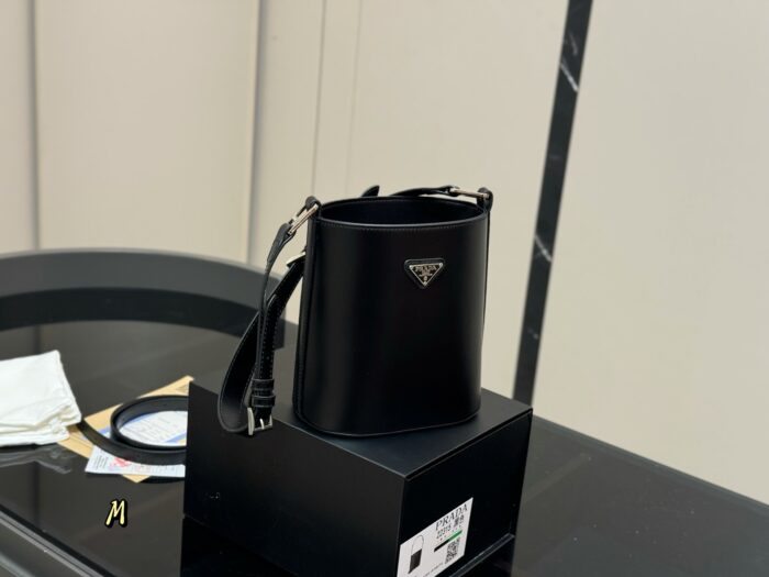 Prada New Bucket Bag Round, Compact And Practical With Long Shoulder Strap - Image 1