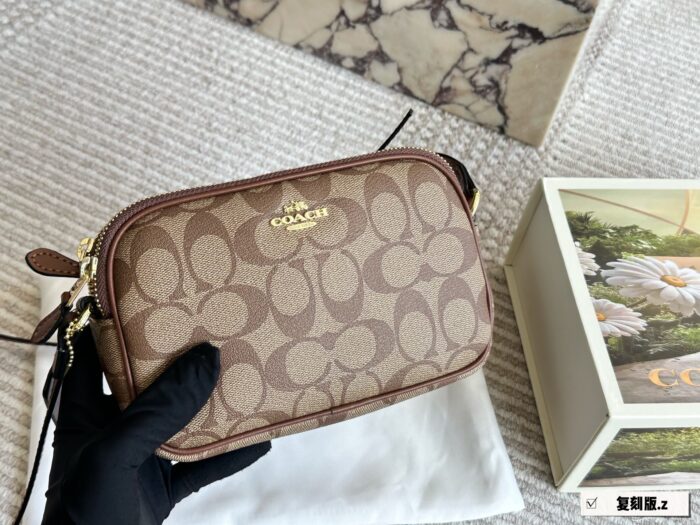Coach Compact Camera Bag With Double Zipper Closure – Small In Size Yet Spacious Inside. Dimensions: 19 × 12 Cm - Image 1