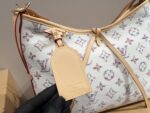 Louis Vuitton 24 Limited Edition Denim Carryall Lightweight And Versatile Styling Riveted Vegetable-Tanned Leather Shoulder Strap - Image 8