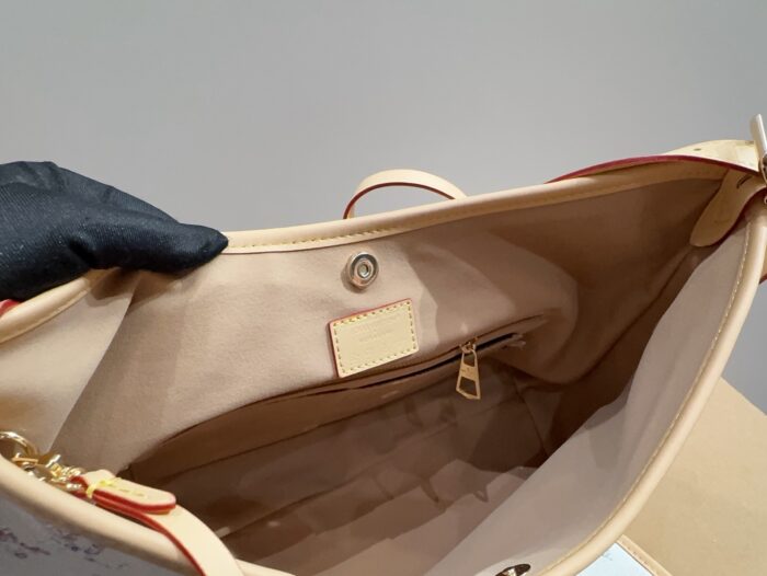 Louis Vuitton 24 Limited Edition Denim Carryall Lightweight And Versatile Styling Riveted Vegetable-Tanned Leather Shoulder Strap - Image 9