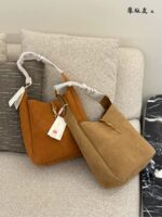Yves Saint Laurent Le 5A7 Hobo Shoulder Bag Clean, Structured Silhouette Signature Clasp Classic Elegance Meets Contemporary Style - Image 2