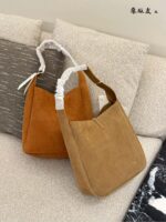 Yves Saint Laurent Le 5A7 Hobo Shoulder Bag Clean, Structured Silhouette Signature Clasp Classic Elegance Meets Contemporary Style - Image 7