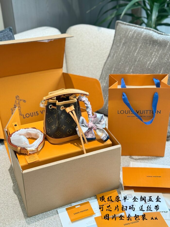Louis Vuitton Nano Noe New Edition Monogram Mini Bucket Bag Detachable Handles And Shoulder Strap For Versatile Carrying Options Practical And Built To Last - Image 1