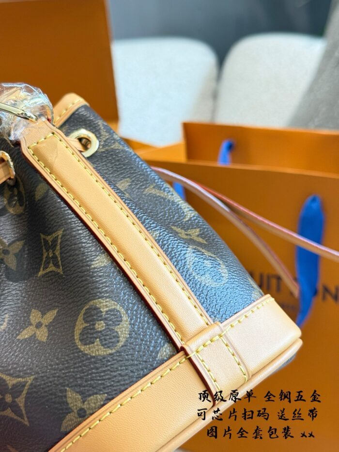 Louis Vuitton Nano Noe New Edition Monogram Mini Bucket Bag Detachable Handles And Shoulder Strap For Versatile Carrying Options Practical And Built To Last - Image 6