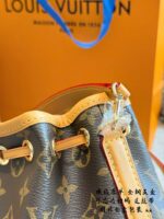 Louis Vuitton Nano Noe New Edition Monogram Mini Bucket Bag Detachable Handles And Shoulder Strap For Versatile Carrying Options Practical And Built To Last - Image 7
