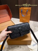 Louis Vuitton Montsouri Embossed Crossbody Messenger Bag Chip Edition All-Black Design Wide Shoulder Strap For Versatility Dual Compartments For Practicality - Image 3