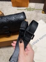 Louis Vuitton Montsouri Embossed Crossbody Messenger Bag Chip Edition All-Black Design Wide Shoulder Strap For Versatility Dual Compartments For Practicality - Image 7