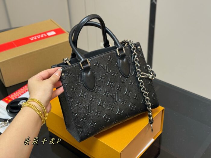 Louis Vuitton On The Go Jungle Shopping Bag Hidden Shoulder Strap For Single-Shoulder Or Hand-Carry Use - Image 2