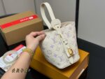 Louis Vuitton Vintage Bucket Bag With Coin Purse - Image 2