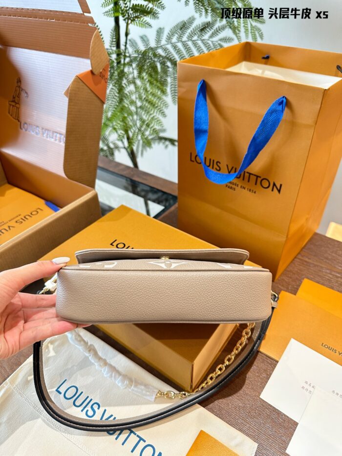 Louis Vuitton Ivy Mahjong Bag Full-Grain Cowhide Leather Chain-Strap Underarm Crossbody Versatile Style Transformations - Image 9