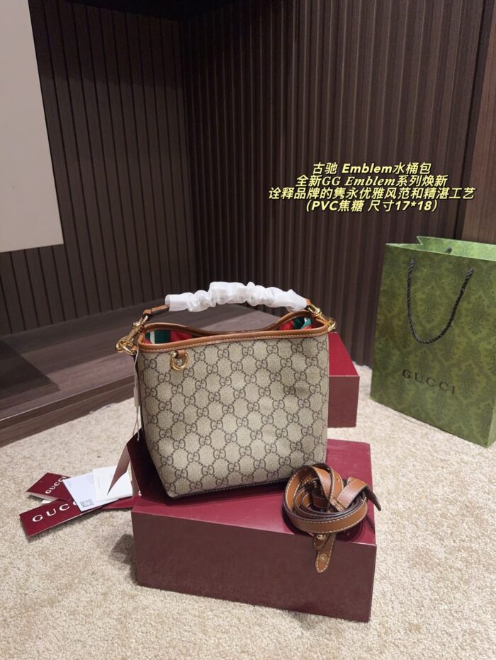 Gucci Emblem Gg-Pattern Coated Fabric Bucket Bag With Leather-Trimmed Webbing Lining - Image 1