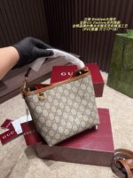 Gucci Emblem Gg-Pattern Coated Fabric Bucket Bag With Leather-Trimmed Webbing Lining - Image 2