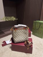 Gucci Emblem Gg-Pattern Coated Fabric Bucket Bag With Leather-Trimmed Webbing Lining - Image 12