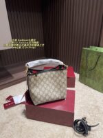 Gucci Emblem Gg-Pattern Coated Fabric Bucket Bag With Leather-Trimmed Webbing Lining - Image 13