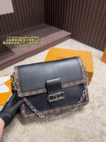 Louis Vuitton Soft Dauphine Epi Black Gold Dauphine Crossbody Bag Black With Gold Hardware Dual Interchangeable Shoulder Straps Structured Silhouette - Image 2