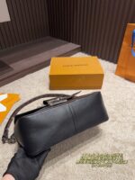 Louis Vuitton Soft Dauphine Epi Black Gold Dauphine Crossbody Bag Black With Gold Hardware Dual Interchangeable Shoulder Straps Structured Silhouette - Image 5
