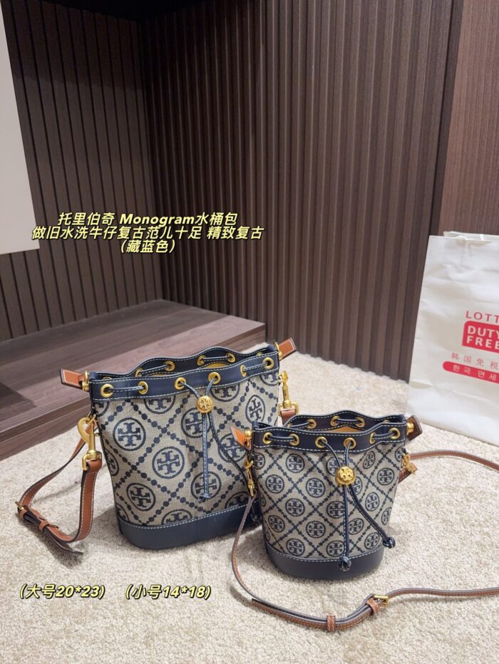 Tory Burch Monogram Distressed Denim Vintage Bucket Bag - Image 1