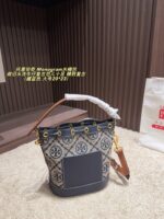 Tory Burch Monogram Distressed Denim Vintage Bucket Bag - Image 3