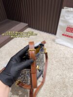Tory Burch Monogram Distressed Denim Vintage Bucket Bag - Image 9