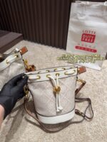 Tory Burch Monogram Distressed Denim Vintage Bucket Bag - Image 12