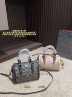 Tory Burch Boston Pillow Bag Retro Pattern Navy Blue Logo Fine-Grained Leather Wide Shoulder Strap Handheld Or Crossbody Generous Capacity