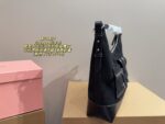 Miumiu Vintage Motorcycle Bag Multi-Pocket, Androgynous, Free-Spirited, Romantic, And Unconventional Refreshing And Enduringly Appealing - Image 4