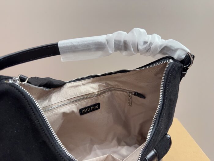 Miumiu Vintage Motorcycle Bag Multi-Pocket, Androgynous, Free-Spirited, Romantic, And Unconventional Refreshing And Enduringly Appealing - Image 9