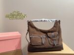 Miumiu Vintage Motorcycle Bag Multi-Pocket, Androgynous, Free-Spirited, Romantic, And Unconventional Refreshing And Enduringly Appealing - Image 10