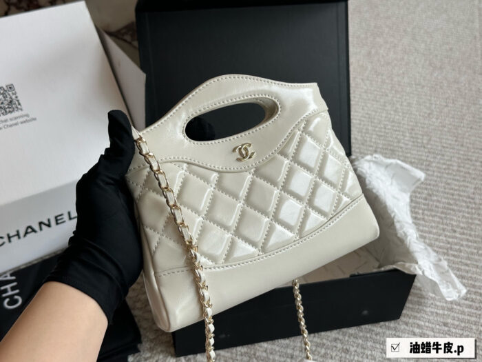 Chanel 31 Bag Nano Waxed Leather Diamond Quilted Chain Bag: Durable And Roomy. - Image 1
