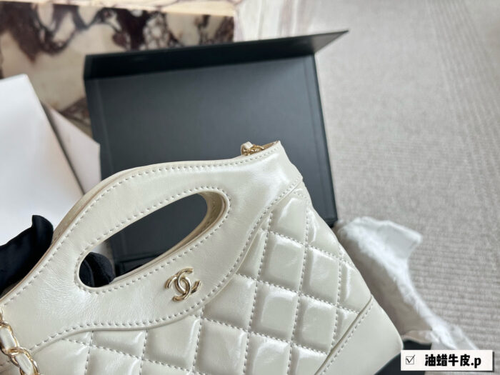 Chanel 31 Bag Nano Waxed Leather Diamond Quilted Chain Bag: Durable And Roomy. - Image 2
