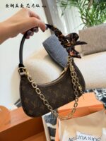 Louis Vuitton Catchy Small Monogram Canvas Leather Trim Chain Handbag - Image 3