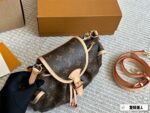 Louis Vuitton Odyssée Metal Chain Side Pockets Multi-Wear Handbag: Carry By Hand, Shoulder Or Crossbody - Image 2