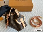 Louis Vuitton Odyssée Metal Chain Side Pockets Multi-Wear Handbag: Carry By Hand, Shoulder Or Crossbody - Image 4