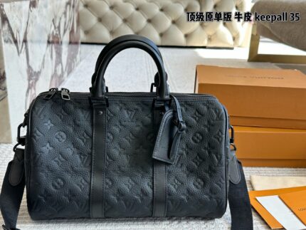 Louis Vuitton Keepall 35 Black Monogram Calfskin Bag With Nylon Wide Shoulder Strap And Luggage Tag