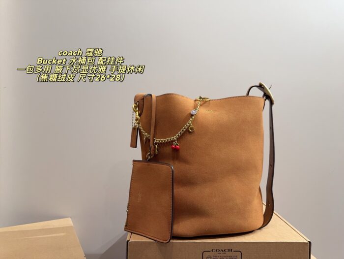 Coach Bucket Bag With Charm Accessory Versatile Bag Elegant Underarm Carry, Handheld Or Crossbody Genuine Cowhide Leather - Image 1