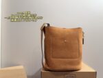 Coach Bucket Bag With Charm Accessory Versatile Bag Elegant Underarm Carry, Handheld Or Crossbody Genuine Cowhide Leather - Image 2