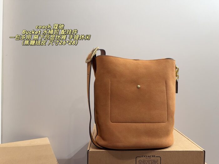 Coach Bucket Bag With Charm Accessory Versatile Bag Elegant Underarm Carry, Handheld Or Crossbody Genuine Cowhide Leather - Image 2