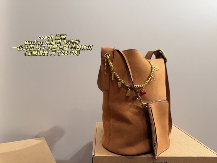 Coach Bucket Bag With Charm Accessory Versatile Bag Elegant Underarm Carry, Handheld Or Crossbody Genuine Cowhide Leather - Image 3