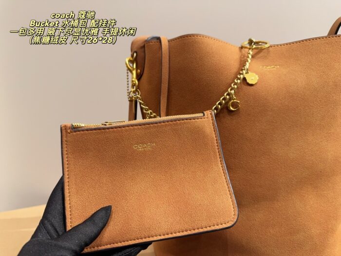 Coach Bucket Bag With Charm Accessory Versatile Bag Elegant Underarm Carry, Handheld Or Crossbody Genuine Cowhide Leather - Image 4