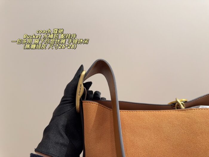 Coach Bucket Bag With Charm Accessory Versatile Bag Elegant Underarm Carry, Handheld Or Crossbody Genuine Cowhide Leather - Image 6